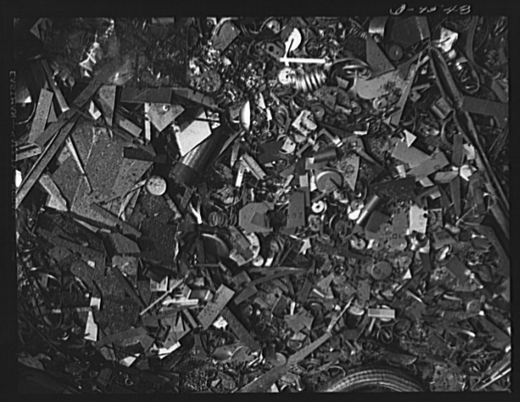 Production. BT-13A ("Valiant") basic trainers. Scrap metal at Vultee's Downey, California plant. At the Downey plant is…
