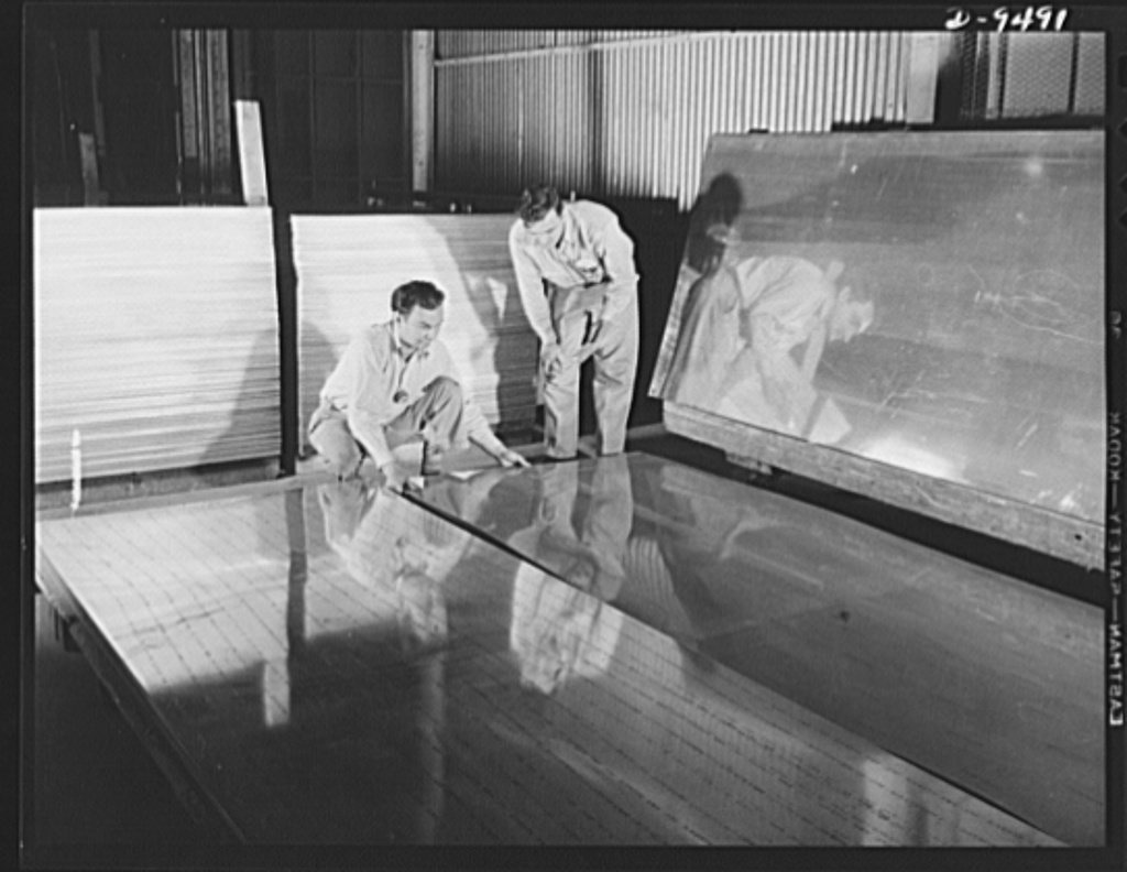 Production. BT-13A ("Valiant") basic trainers. Sheet aluminum for warplane construction being sorted at Vultee's Downey…