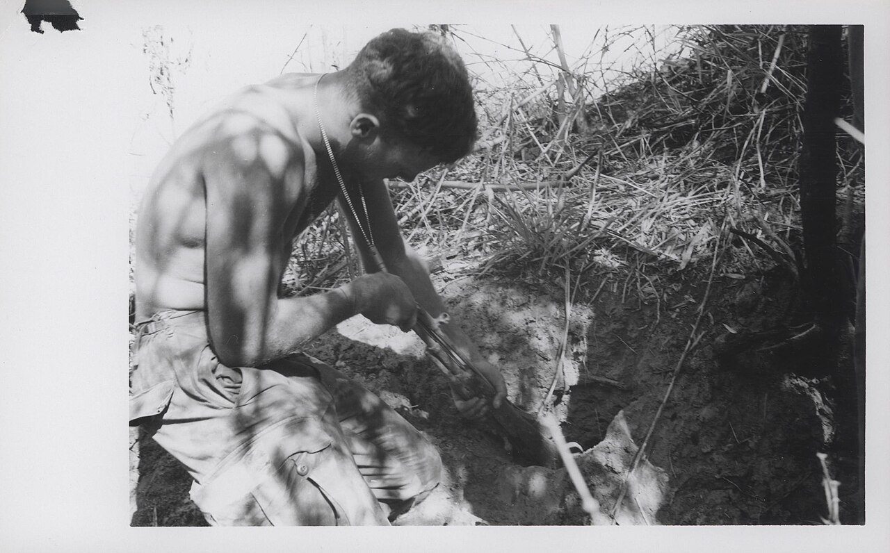 Eugene Ottonello Recovers an Enemy Rifle, 1969