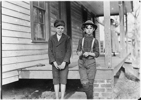 Springstein Mill. John Lewis (boy with hat), 12 years old, 1 year in mill. Weaver - 4 looms. 40 (cents) a day to... - N…