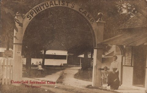 Entrance Gate House to Camp with Woman and Child, 1910