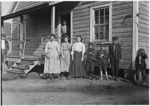 Nearly all of family works in mill. Father in doorway, Mrs. A.L. Conyers (at end) not in mill. Llewlyn, Bessie... - NAR…