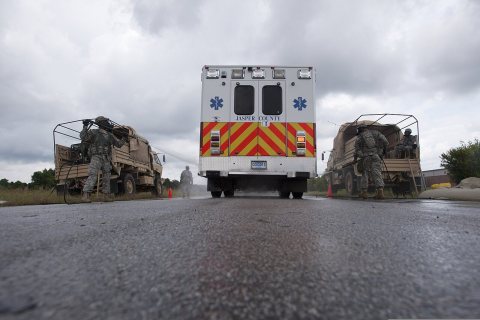 U.S. Soldiers assigned to the 108th Chemical Company, South Carolina Army National Guard wash a first responder vehicle…