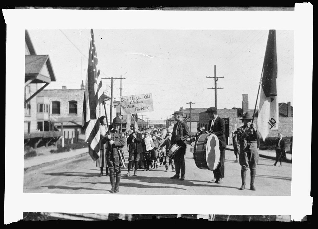 Pittsburg, Cal., school children in first parade for Red Cross milk fund. Slogan "give us old clothes for milk" brought…
