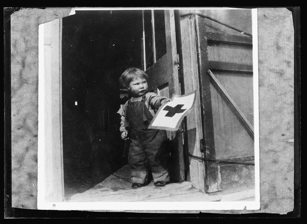 This very small orator was photographed while talking for the Red Cross at Quinn, S.D
