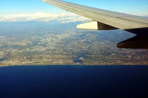 Aerial view of California Coast, looking east by NE - Carlsbad and Encinitas, centered near Batiquitos Lagoon