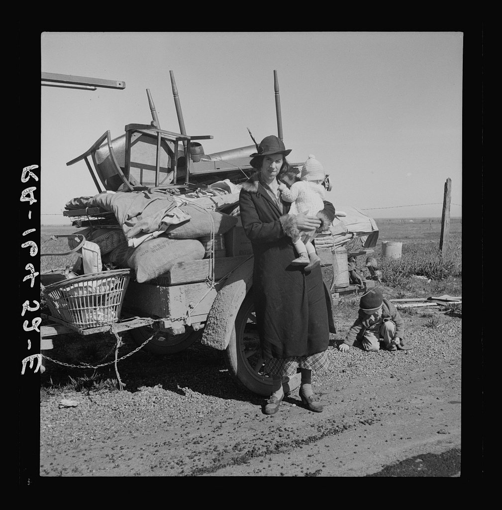 Missouri family of five, seven months from the drought area. "Broke, baby sick, car trouble." U.S. 99 near Tracy, Calif…