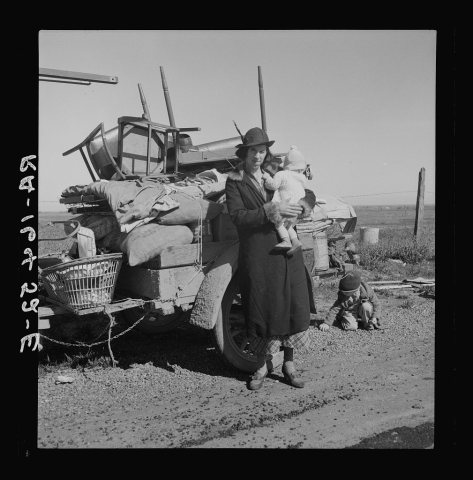 Missouri family of five, seven months from the drought area. "Broke, baby sick, car trouble." U.S. 99 near Tracy, Calif…