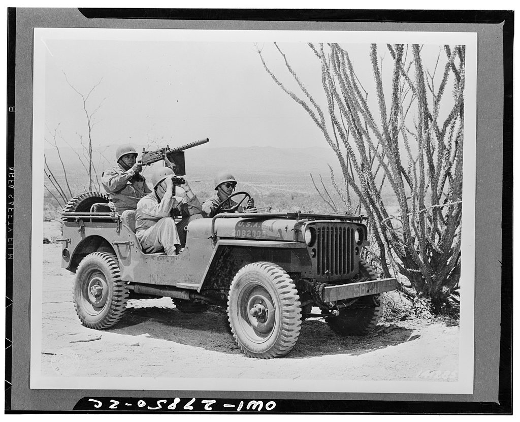 Indio, California. Jeep and crew on a reconnaisance patrol in the desert of the desert training center