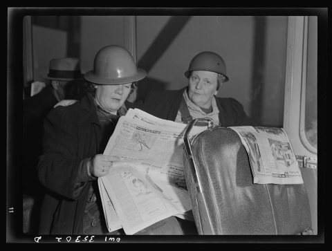 Richmond, California. Women shipyard workers riding to the yards