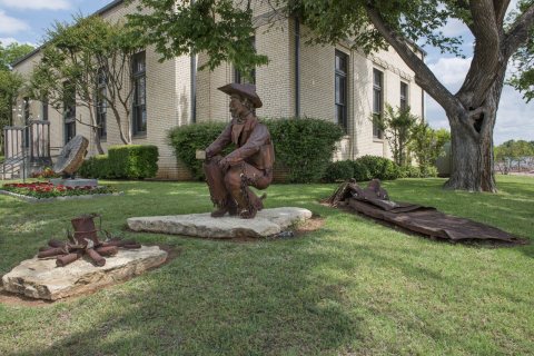 "Early Morning on the Goodnight-Loving Trail," a 2005 sculpture by artist Joe Barrington in Graham, Texas. Charlie Good…