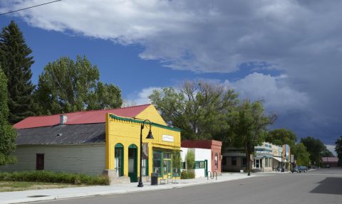 Colorful main street, including the offices of the Saguache Crescent newspaper in the bright yellow building