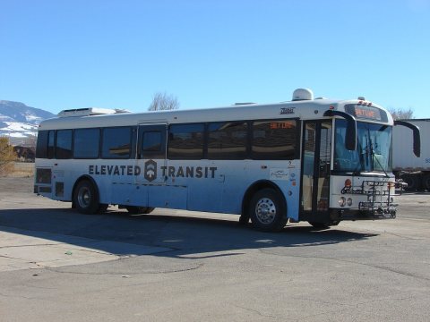 Elevated Transit Thomas HDX bus at Centerfield Chevron 1