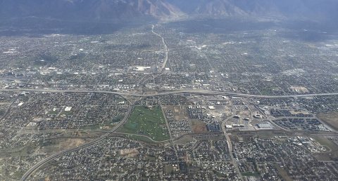 2015-11-03 10 13 04 View east from an airplane along the southern portion of Interstate 215 as it crosses the cities of…