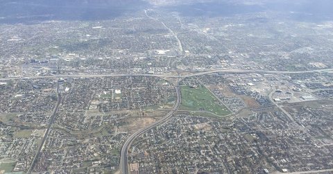 2015-11-03 10 12 52 View east from an airplane along the southern portion of Interstate 215 as it crosses the cities of…