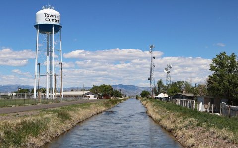 Center, Colorado water tower and irrigation canal