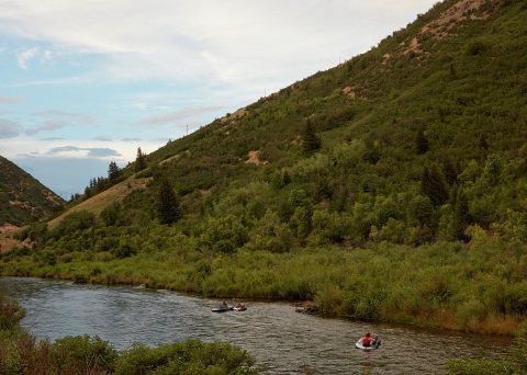 Rafters enjoy a ride down the Provo River in Provo Canyon, near Orem, Utah