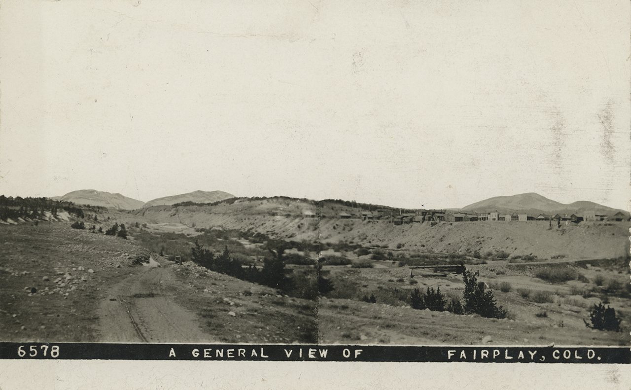 Photographic postcard depicting an old road crossing a river at Fairplay in the early 1900s - DPLA - 032af1e10aec4e5dd7…