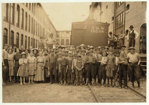 A part of the spinning force working in the Washington Cotton Mills, Fries, Va. Group posed by the overseer. All work. …