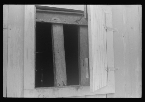 Window for ventilation at barracks for migratory workers at Webster Canning Company