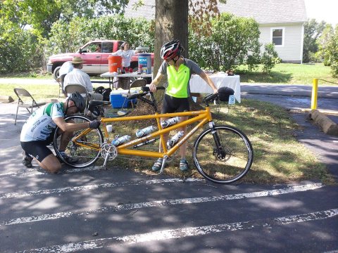 Rider fixing Cannondale tandem bicycle Shenandoah Valley Bicycle Festival Our Community Place Timberville VA July 2012
