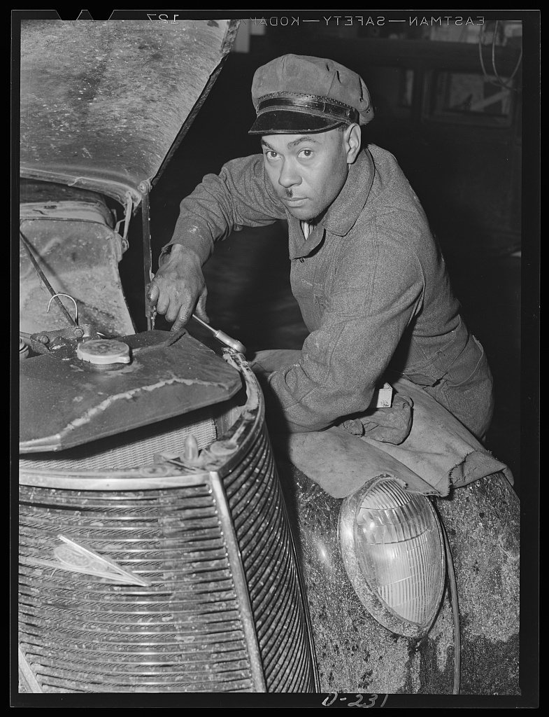 Shenandoah Valley. Worker in Spitzer's Garage