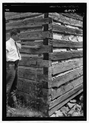 Hewn log details. Not logs toenailed with cut spikes - King's Mill, U.S. Highway 60