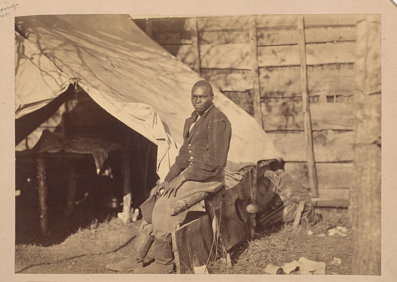 [Black Soldier in Camp]