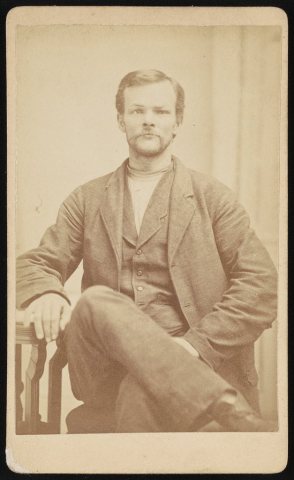 Henry Sparks, head-and-shoulders portrait, seated, facing front