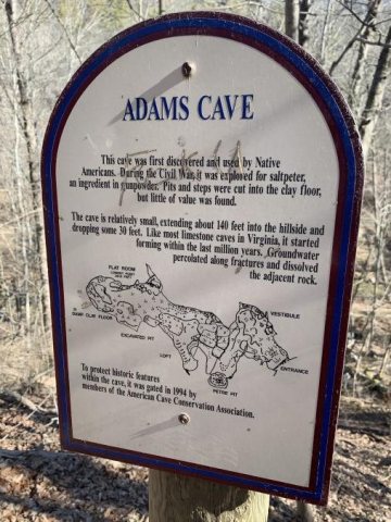 Adams Cave Sign in