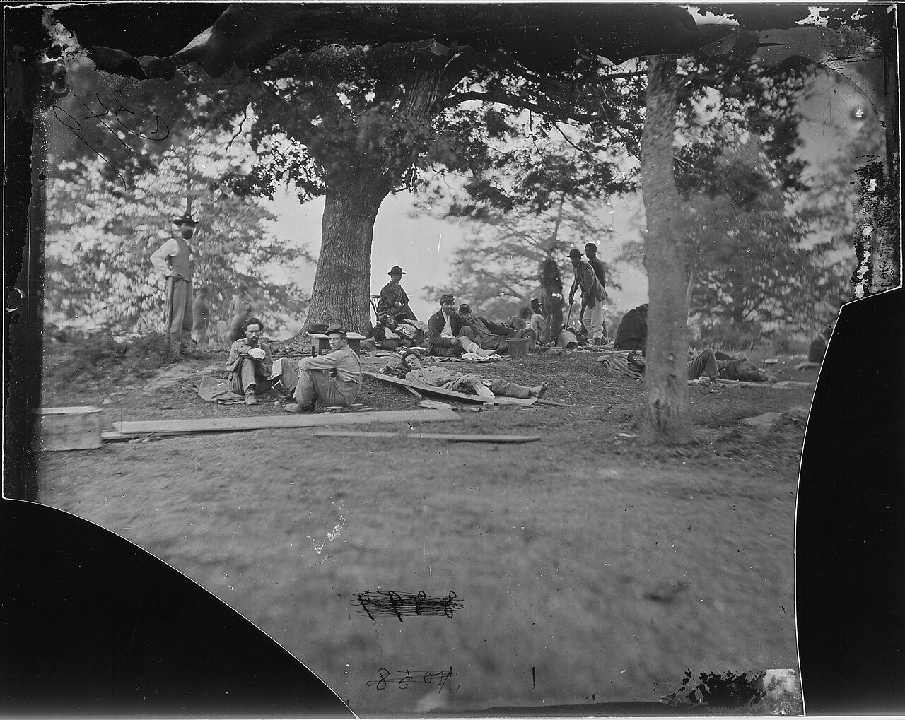 Wounded soldiers under trees, Marye's Heights, Fredericksburg. After the battle of Spotsylvania, 1864