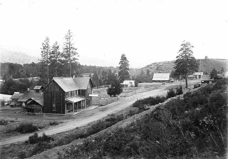 Town, possibly Twisp, along river, 1900-1910