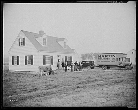 Family moving into their new home. Longview Homesteads, Washington