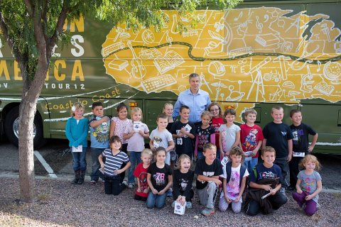 Arne Duncan with first grade students on Constitution Day