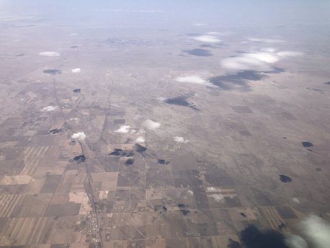 2022-03-24 18 16 35 UTC minus 6 View north and down from an airplane along U.S. Route 85 in western Weld County, Colora…