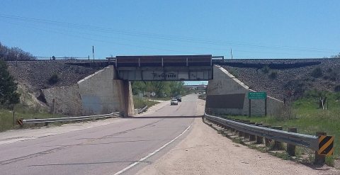 Rio Grande bridge, Monument City Limit sign