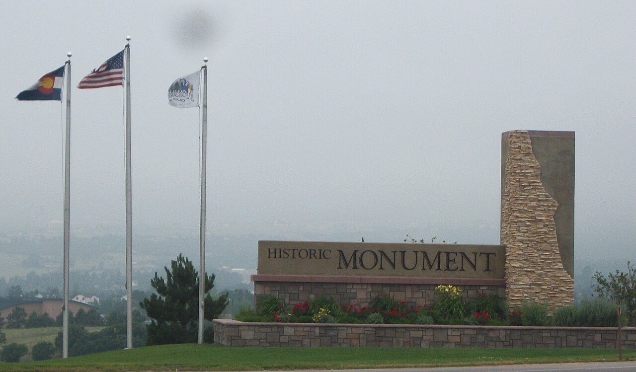 Monument welcome sign