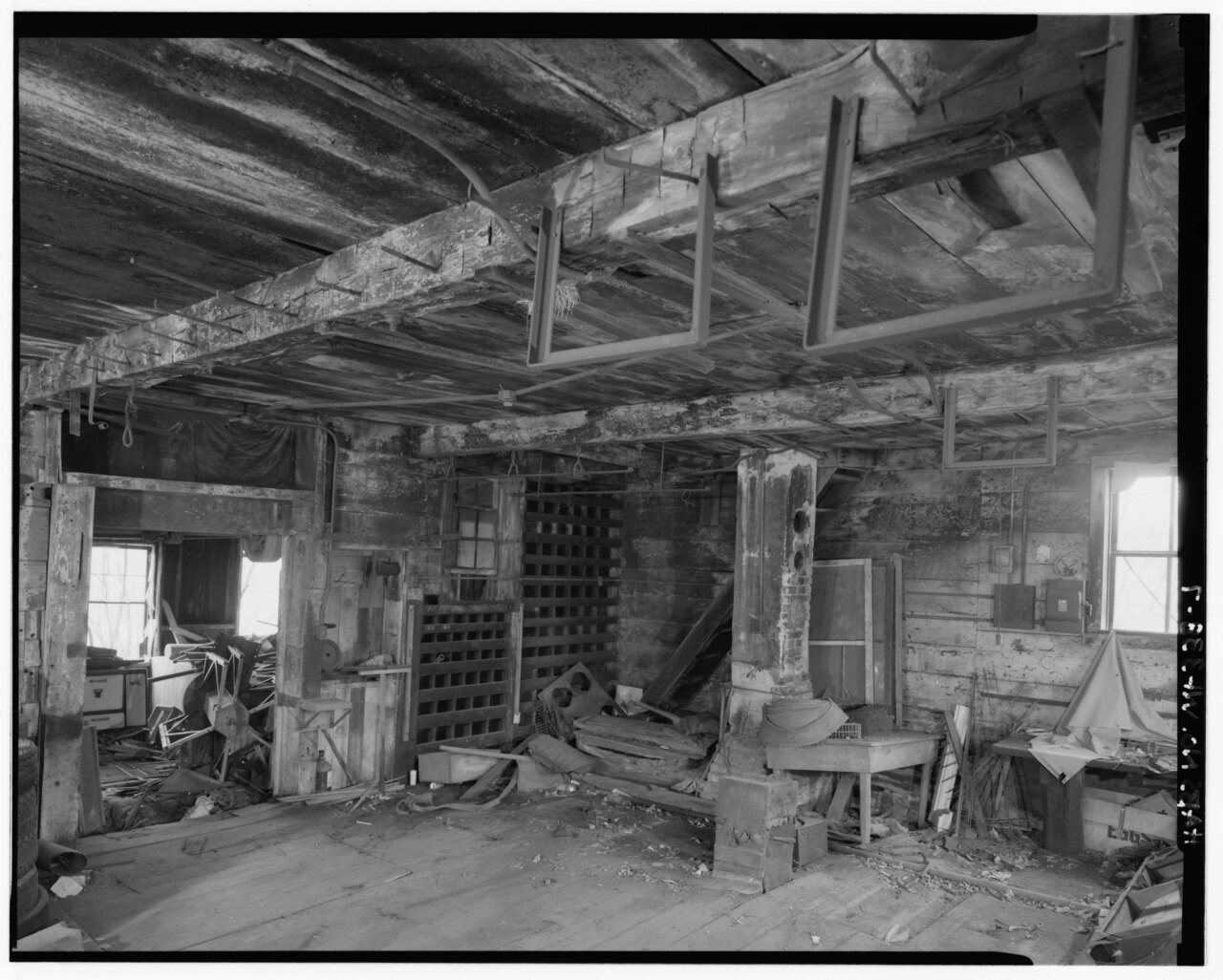 INTERIOR OF BLACKSMITH SHOP, LOOKING NORTHWEST - Ferdinand Schulz Blacksmith and Wheelwright Shop, W3222 Highway 32, Ho…
