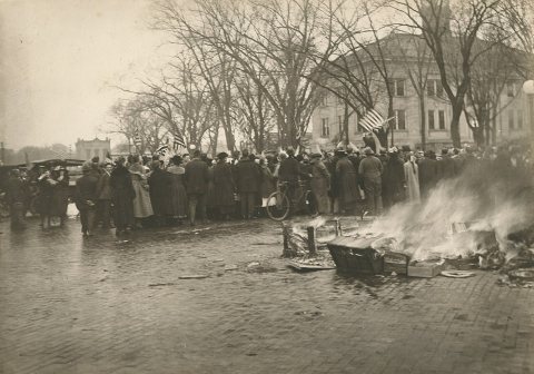A pile of German textbooks, from the Baraboo High School, burning on a street in Baraboo, Wisconsin, during an anti-Ger…