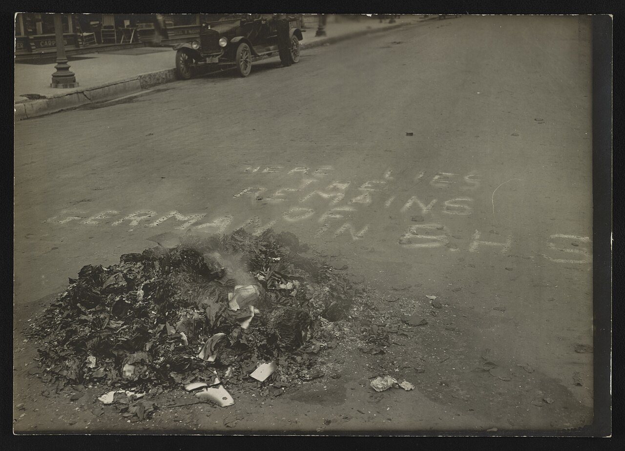 Pile of ashes in street after burning of German textbooks from the Baraboo High School, Baraboo, Wisconsin during an an…