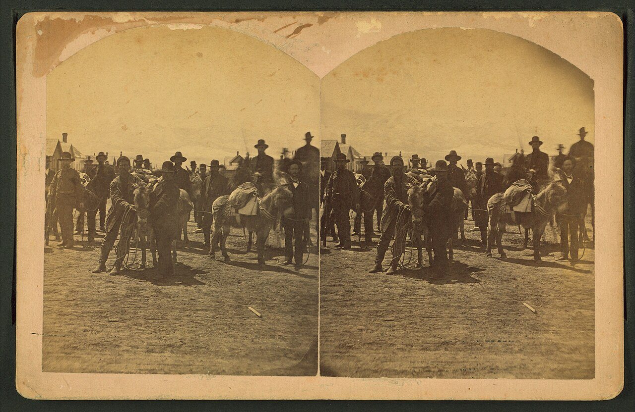 Silver Cliff, Colo. [showing a group of men, some with burros]