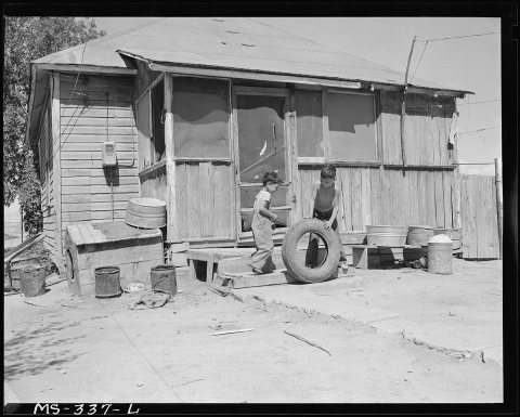 Rear of home of Sam Lontine, miner. Puritan Camp, Erie, Colorado