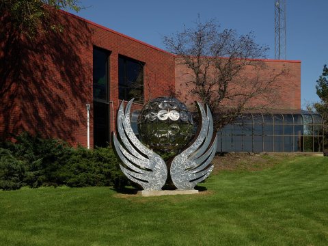Unusual sculpture on the Black Hawk College's East campus, near Galva, Illinois. The stainless steel sculpture includes…