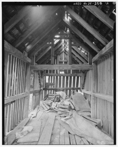 First floor- view of interior of crib walls and framing looking northeast - J. Moore Farmstead, Corncrib, East side of …