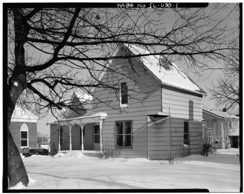 VIEW NORTHEAST SHOWING WEST (FRONT) AND SOUTH ELEVATIONS - 809 Rodgers Street (House)