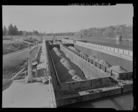 BARGES WAITING TO ENTER DOWNSTREAM LOCK GATE. LOOKING WEST. - Illinois Waterway, Dresden Island Lock and Dam , 7521 Nor…