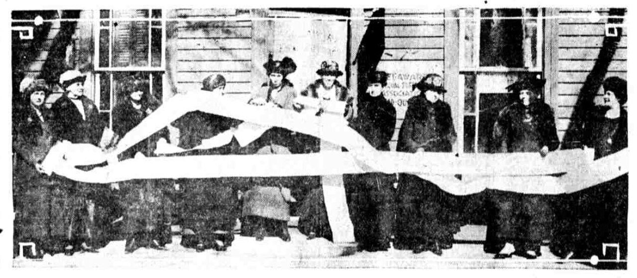 Suffragists in Dover display the 26,000 signatures for women's suffrage, March 22, 1920