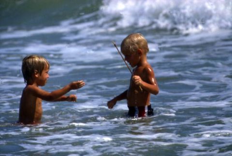 View of boys in the surf at Sebastian Inlet State Park