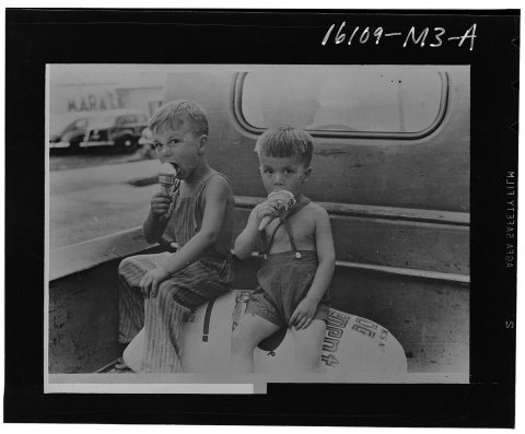 Farm boys eating ice-cream cones. Washington, Indiana