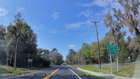 FL24 SB Directional road sign local places, Bronson dashcam